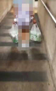 富泰邨10歲女童吃力搬兩袋啤酒　稱「爸爸唔畀幫」　老師睇片即報警